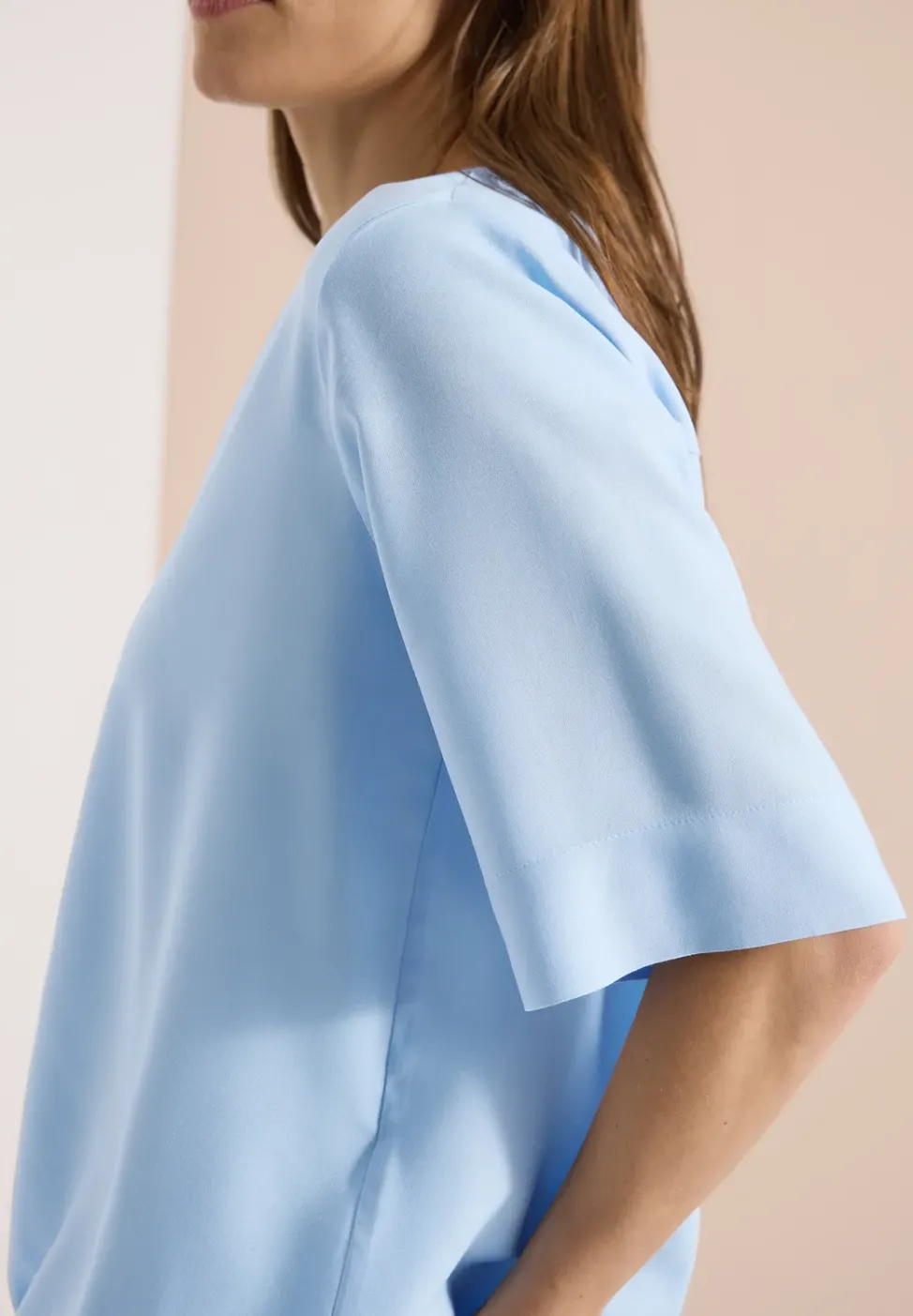 Blouse avec col fendu et ourlet élastique