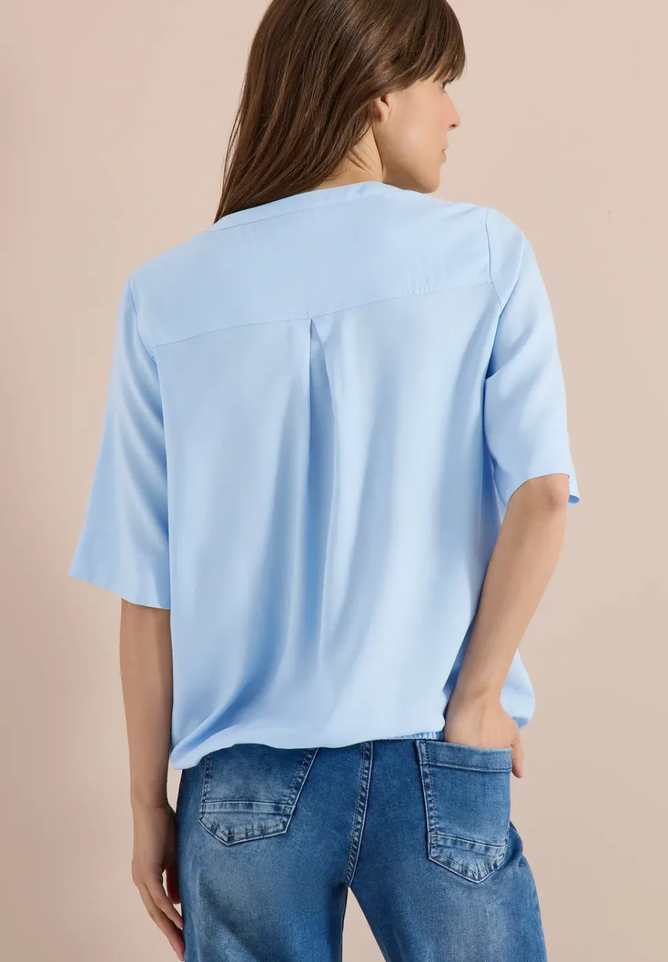 Blouse avec col fendu et ourlet élastique