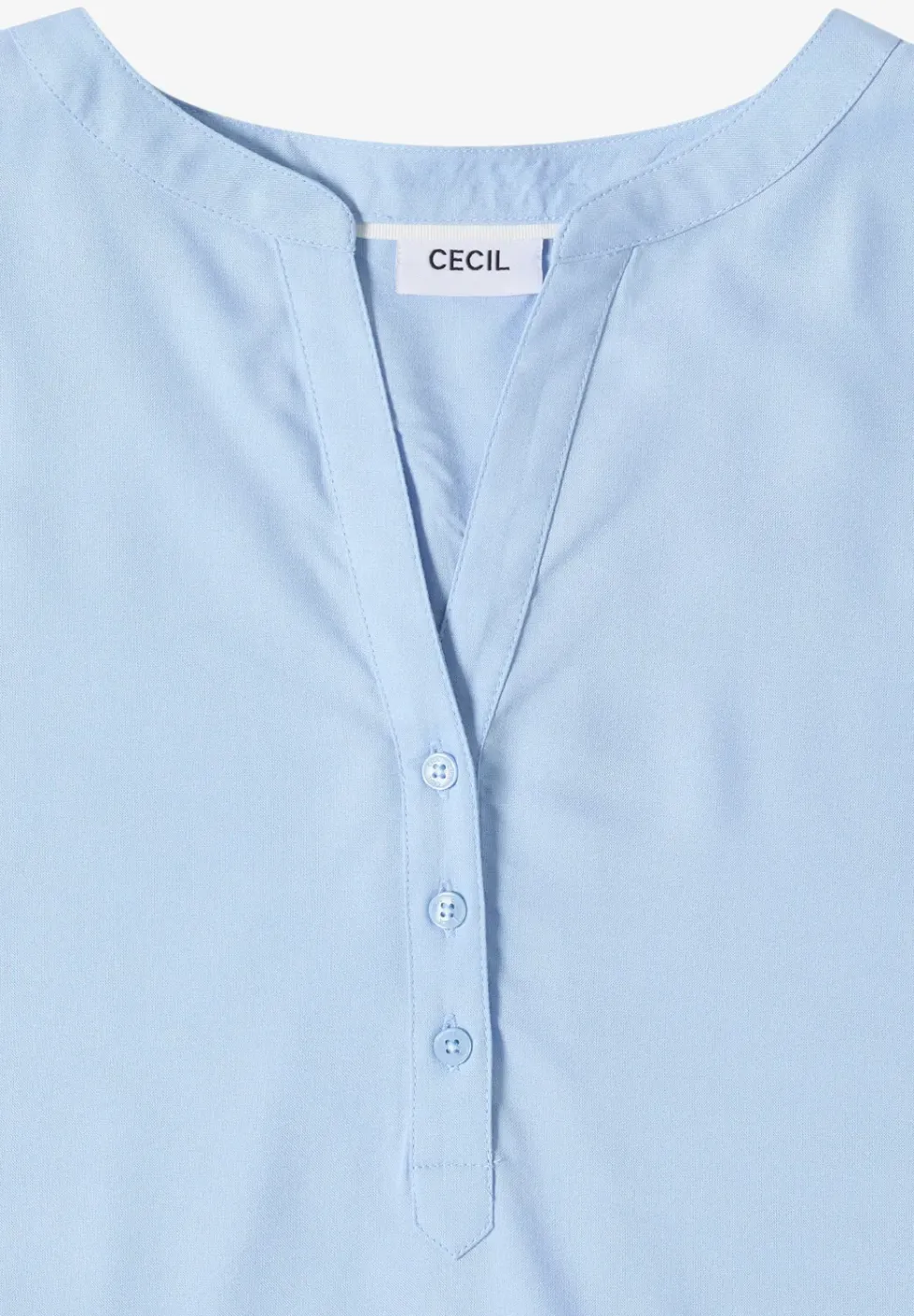 Blouse avec col fendu et ourlet élastique