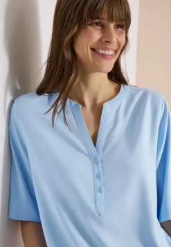 Blouse avec col fendu et ourlet élastique