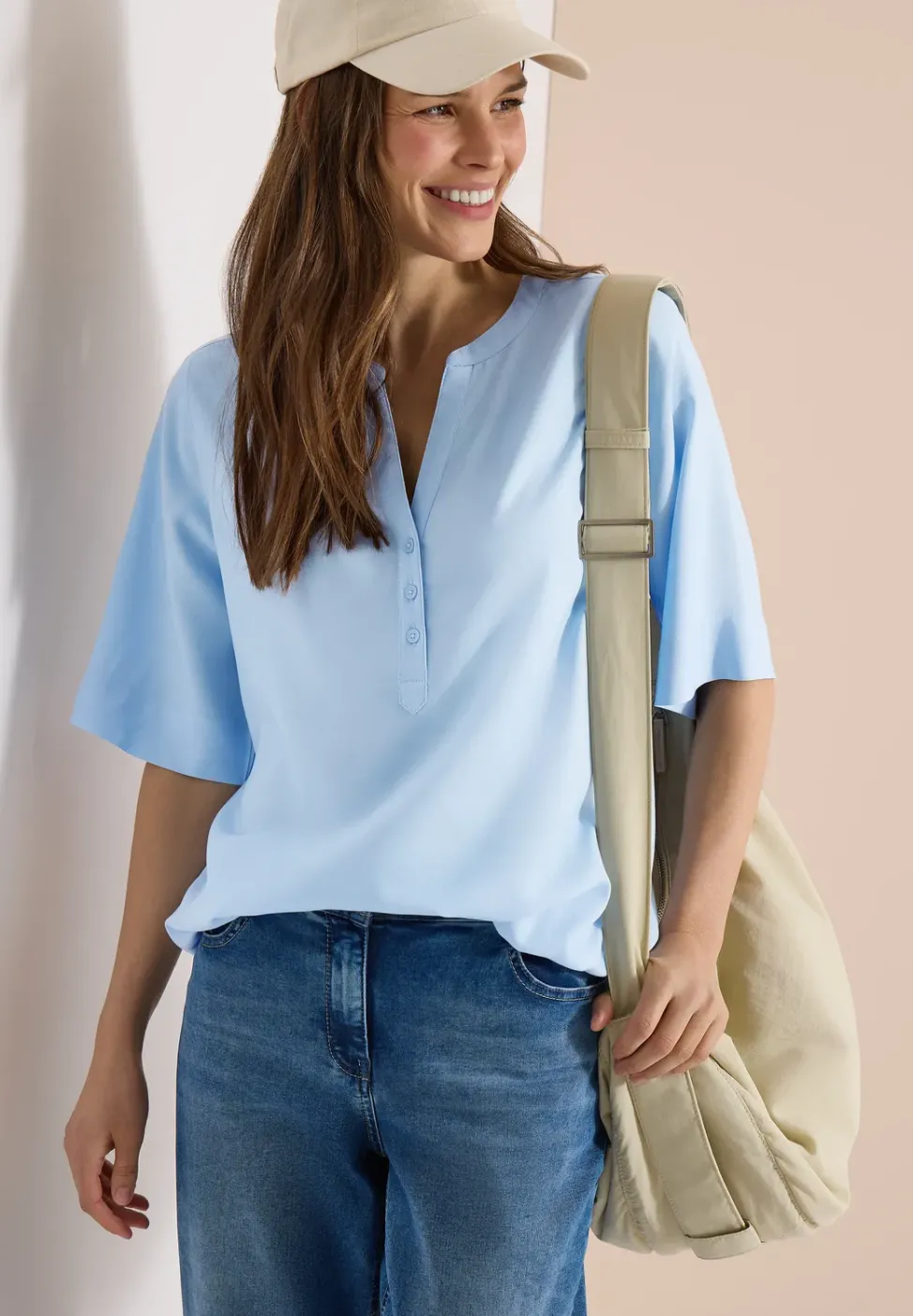 Blouse avec col fendu et ourlet élastique