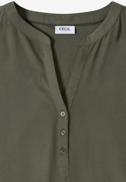 Blouse avec col fendu et ourlet élastique