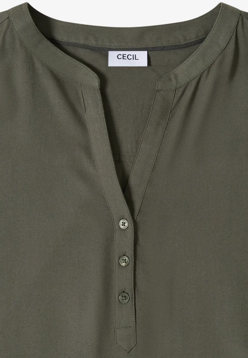 Blouse avec col fendu et ourlet élastique