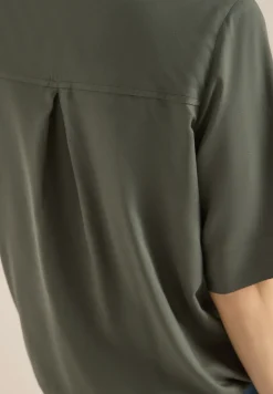 Blouse avec col fendu et ourlet élastique