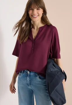 Blouse avec col fendu et ourlet élastique