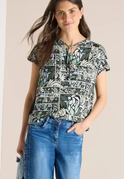Blouse avec col fendu et mélange de structures