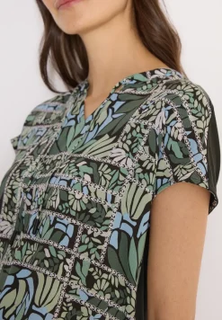 Blouse avec col fendu et mélange de structures