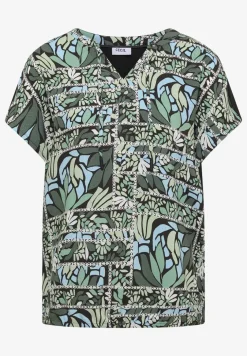 Blouse avec col fendu et mélange de structures