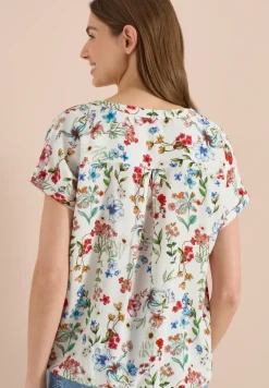 Blouse avec col fendu et motif floral