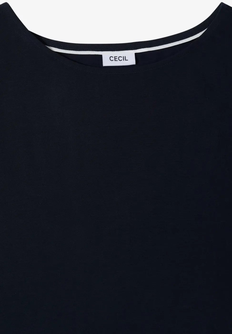 Blouse avec col rond et détail de nœuds