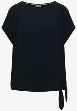 Blouse avec col rond et détail de nœuds