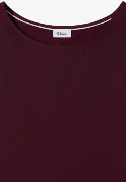 Blouse avec col rond et détail de nœuds