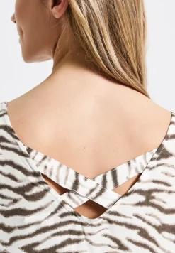 Blouse avec décolleté dans le dos