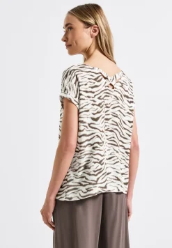 Blouse avec décolleté dans le dos