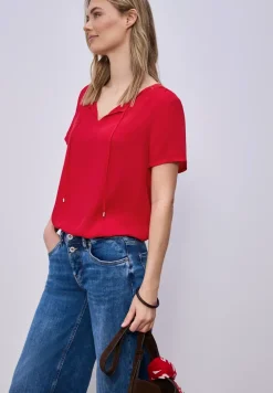 Blouse avec détail de string