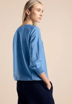 Blouse avec détail smocké