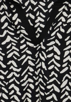 Blouse avec détails de bande