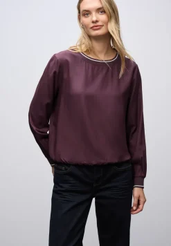 Blouse avec détails de bande