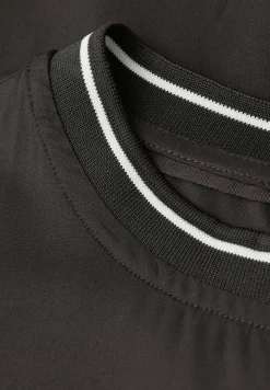 Blouse avec détails de bande