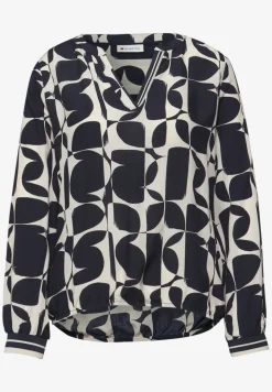 Blouse avec détails en tape