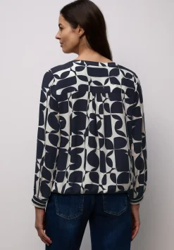 Blouse avec détails en tape