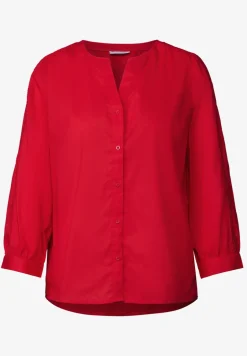 Blouse avec détails en tape