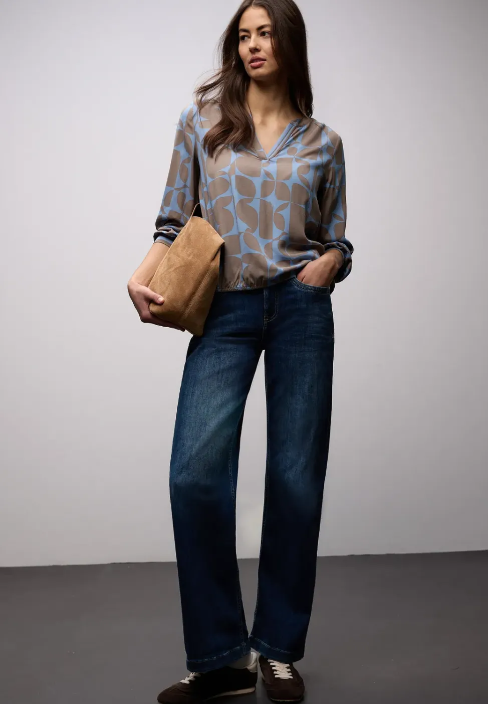 Blouse avec détails en tape
