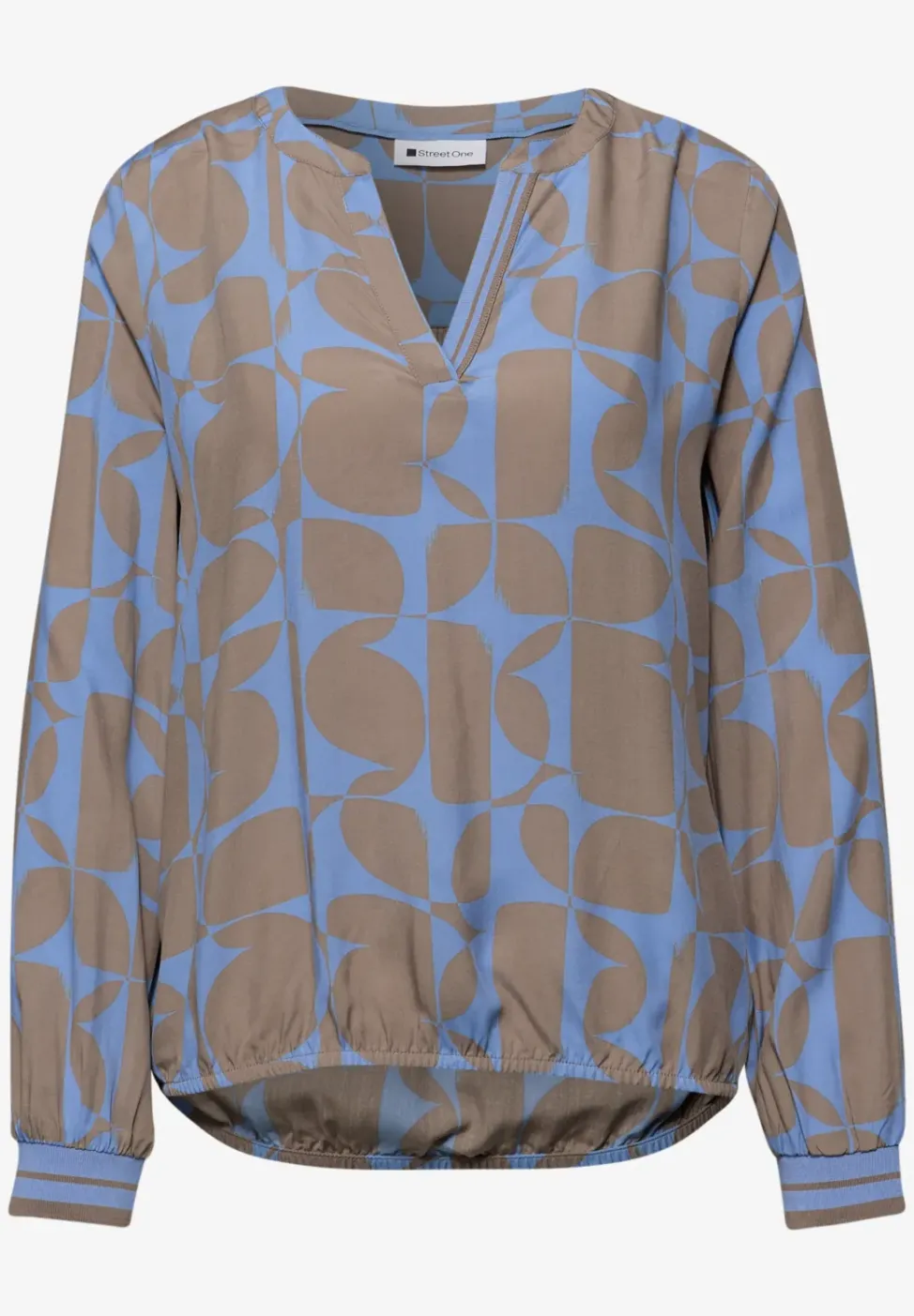 Blouse avec détails en tape