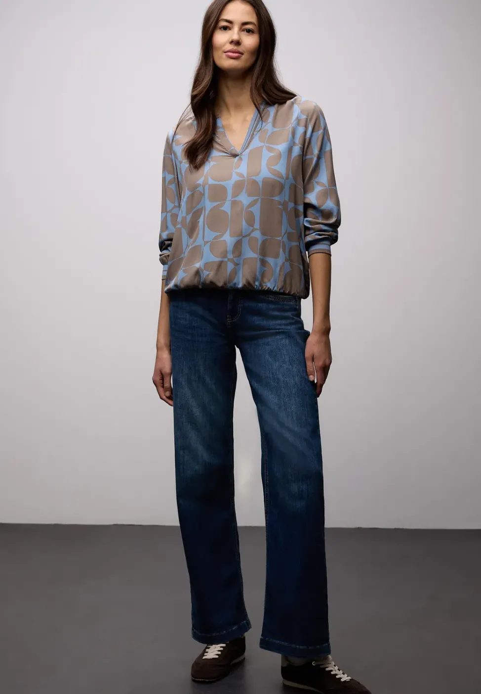 Blouse avec détails en tape