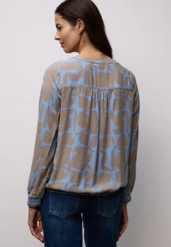 Blouse avec détails en tape