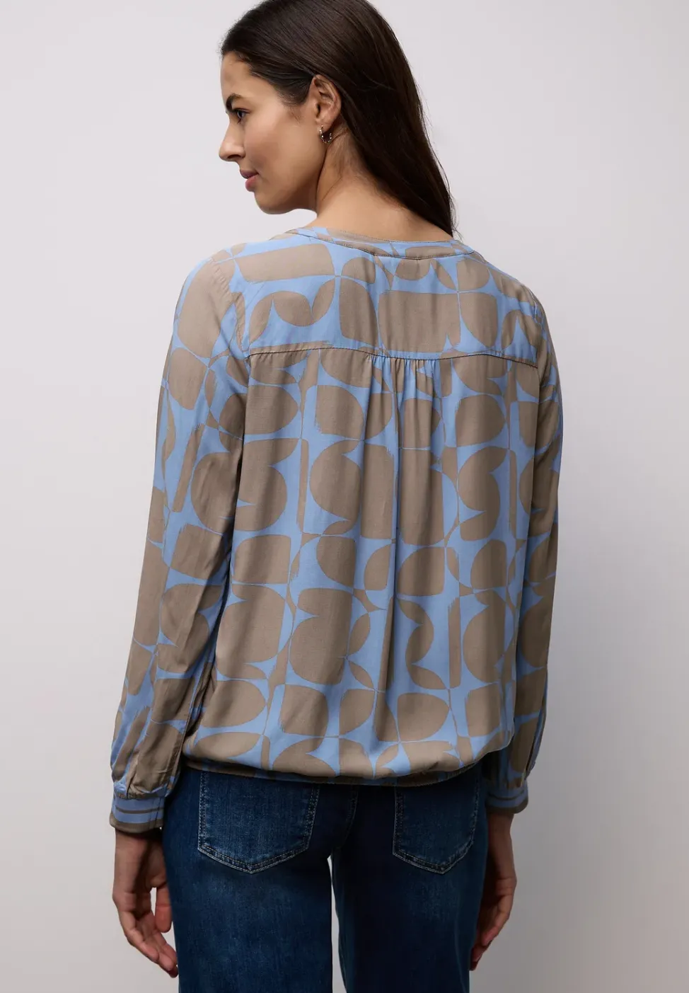 Blouse avec détails en tape