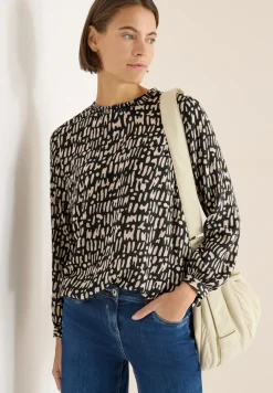 Blouse avec encolure smockée