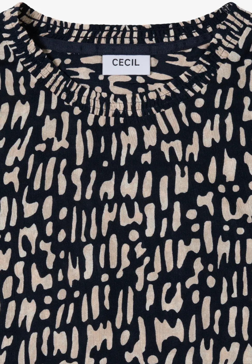 Blouse avec encolure smockée