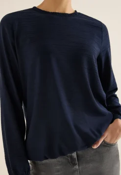 Blouse avec encolure smockée