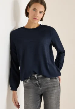 Blouse avec encolure smockée