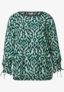 Blouse avec fronces sur les bras