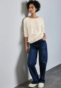 Blouse avec ourlet froncé