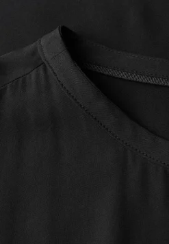 Blouse avec ourlet élastique