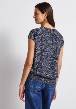Blouse avec ourlet smocké
