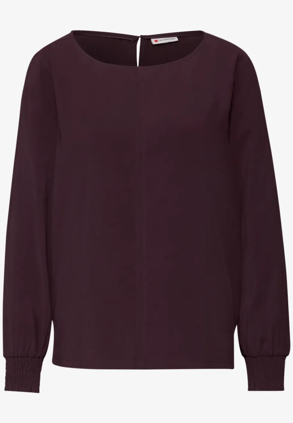 Blouse avec poignets smockés