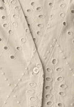 Blouse brodée à col fendu