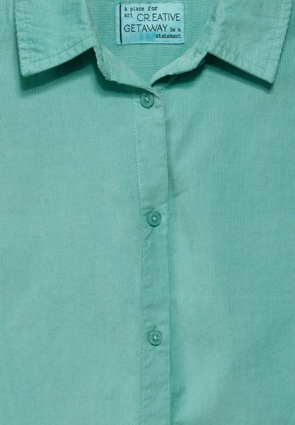 Blouse courte en velours côtelé