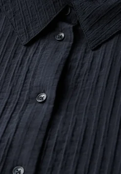 Blouse courte structurée