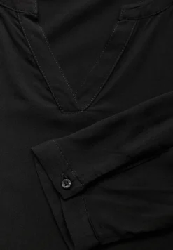 Blouse en couleur unie