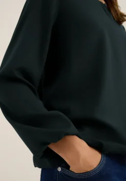 Blouse en couleur unie