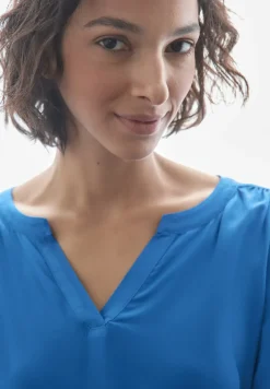 Blouse en couleur unie