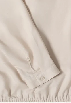 Blouse en couleur unie