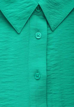 Blouse en couleur unie