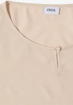 Blouse en couleur unie