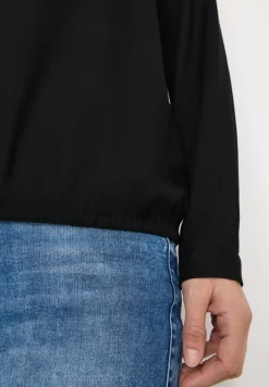 Blouse en couleur unie